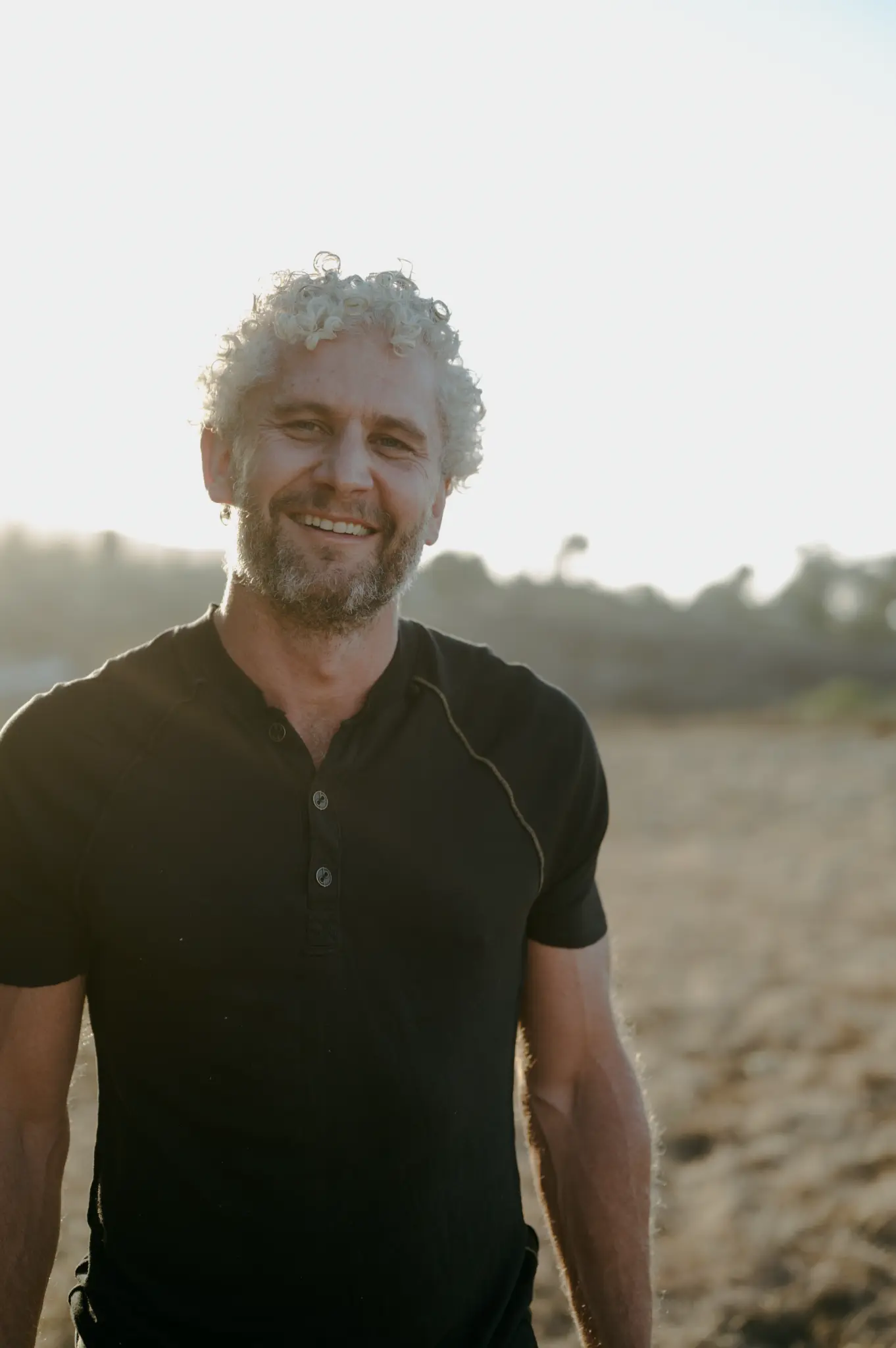 Dustin Mann outdoors in warm evening light